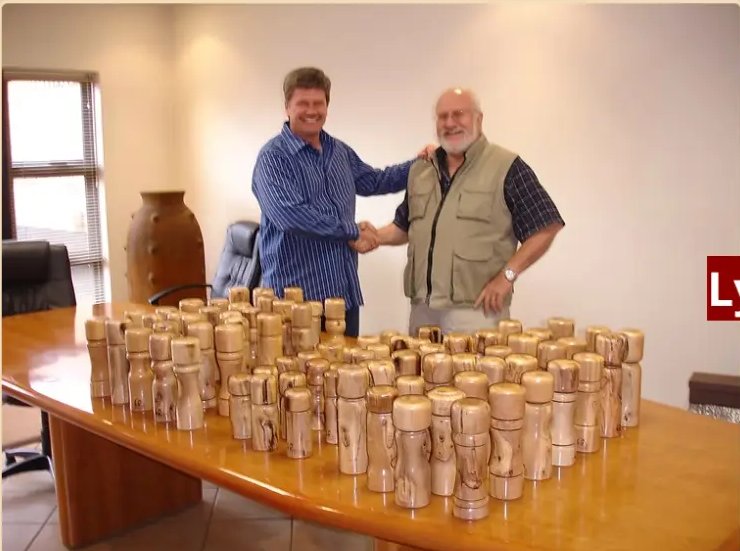 Boardroom hand-over — handmade pepper mills by Pepper Mills For Africa