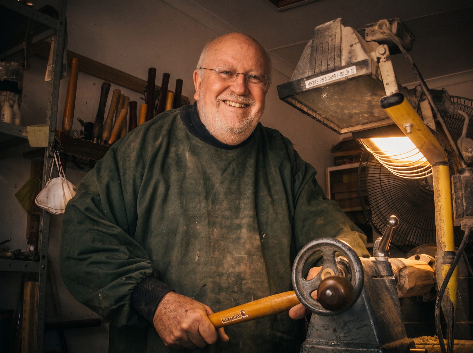 Piet Smith at his lathe turning a wooden pepper mill blank